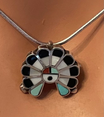 Sunface Anhnger und Brosche